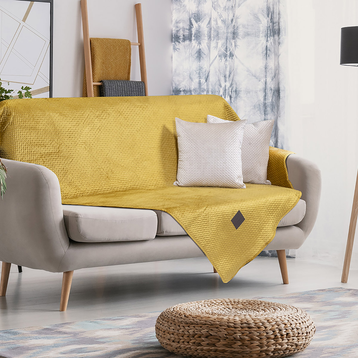 Pouf,And,Plant,Near,Settee,With,Pillows,In,Bright,Apartment